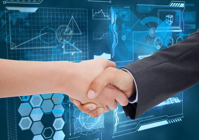 Business executives shaking hands with a futuristic digital background, symbolizing successful partnerships and technological collaboration. Ideal for use in business presentations, corporate websites, and articles on innovation and professional networking.