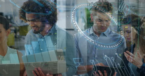 Diverse Coworkers Analyzing Digital Data Overlay in Modern Office