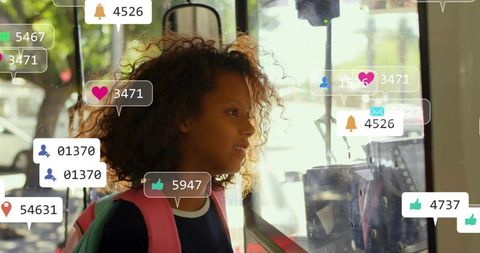 Teenage girl looking through bus window with social media notification icons overlay