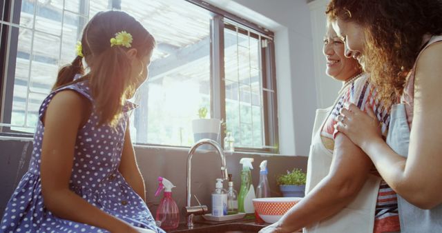 Multigenerational Family Bonding in Kitchen with Natural Light - Download Free Stock Images Pikwizard.com