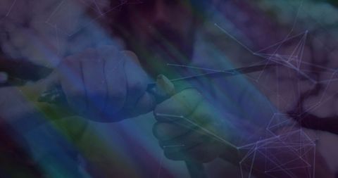 Person Carving with Knife in Natural Blue-hued Landscapes