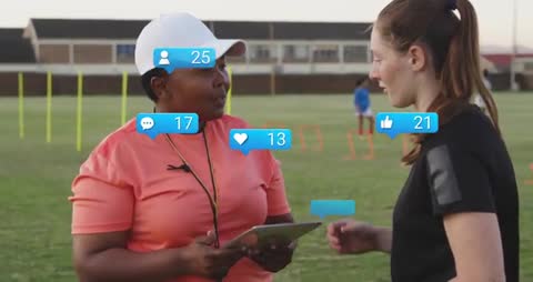 Athletic Coach Using Technology During Training Session with Athlete