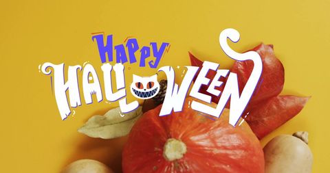 Happy Halloween Text with Pumpkins and Autumn Leaves