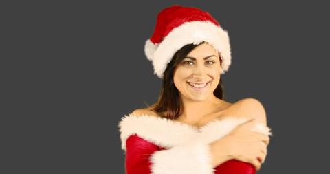 Smiling Woman in Christmas Santa Outfit Embracing Festive Joy - Download Free Stock Images Pikwizard.com