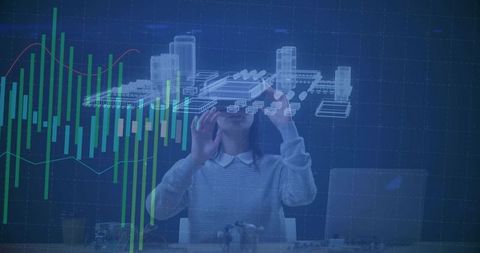 Woman Engineering Holographic Building with VR headset and Digital Charts