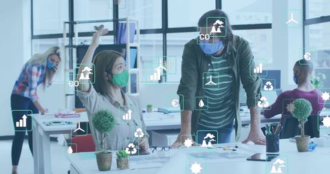 Eco Icons Surrounding Diverse Professionals in Office Environment