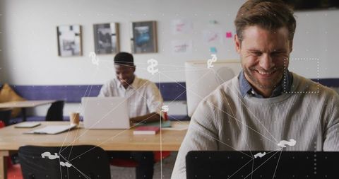 Smiling Professionals Engaging in Collaborative Office Network