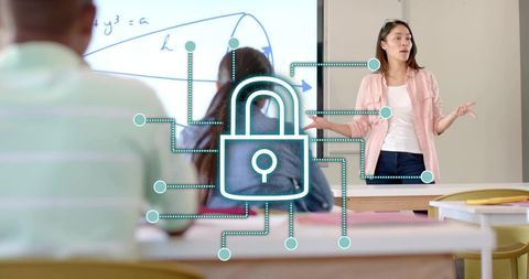 Teacher presenting connected security concept to students with digital padlock overlay