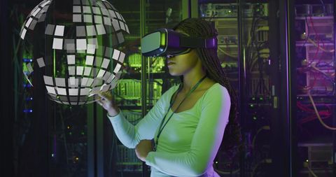 African American Woman Using VR Headset in Data Center