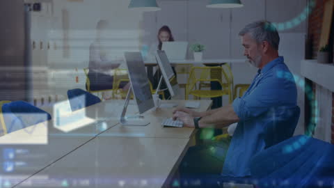 Senior Executive Analyzing Financial Charts on Office Computer