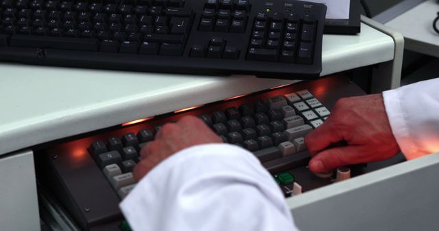 Hands of caucasian male doctor writing on computer in medical lab - Download Free Stock Photos Pikwizard.com