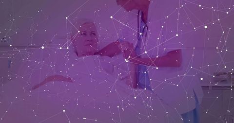 Healthcare Professional Administering Treatment to Patient in Hospital