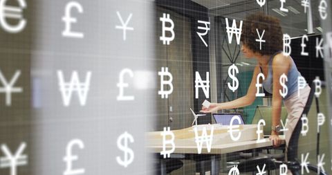 Businesswoman Analyzing Global Currency Strategies in Office