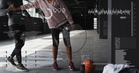Dribbling basketball training duo in industrial gym with futuristic hud overlay