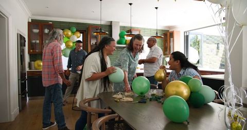 Seniors decorating home for a festive celebration