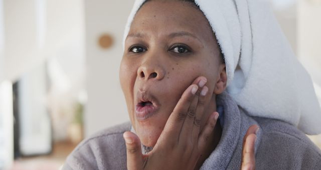 Woman Examining Skin Condition in Mirror After Shower - Download Free Stock Images Pikwizard.com