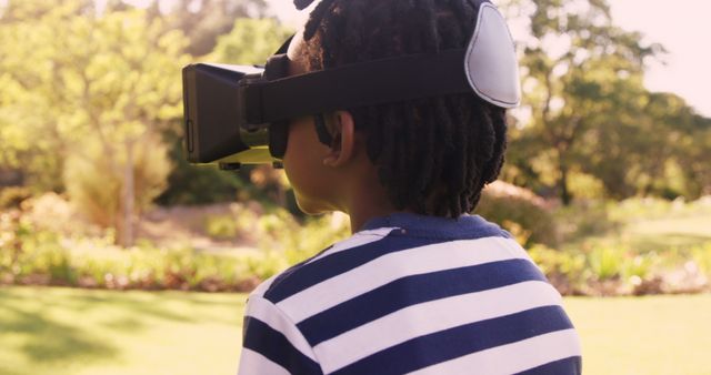 Child Exploring Virtual Reality Outdoors Wearing Headset - Download Free Stock Images Pikwizard.com