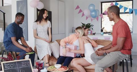 Multiracial Friends Celebrating Baby Shower with Gifts