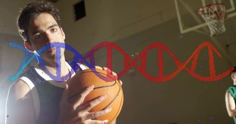Athletic Young Man Holding Basketball with DNA Concept Graphic Overlay