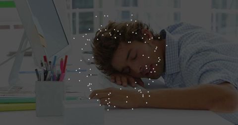 Office Worker Asleep at Desk During Work Hours