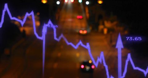 Dynamic Stock Graphs Over Traffic Represents Urban Economy - Download Free Stock Images Pikwizard.com