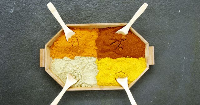 Assortment of Colorful Spices in Wooden Tray with Spoons - Download Free Stock Images Pikwizard.com