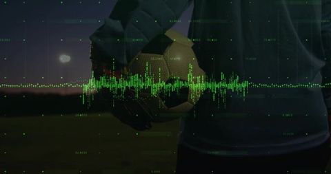 Goalkeeper and digital data interface in evening soccer field