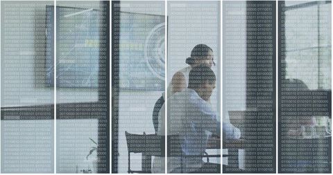 Business professionals typing behind glass panels with binary code overlay, futuristic office