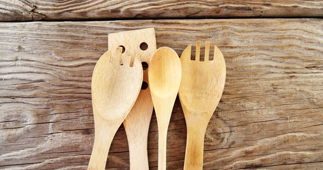 Assorted Wooden Kitchen Utensils on Rustic Wooden Table - Download Free Stock Images Pikwizard.com