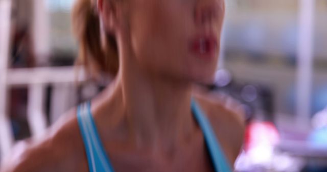 Fit Woman Running on Treadmill in Gym with Determined Expression - Download Free Stock Images Pikwizard.com