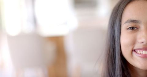 smiling teenage girl in bright minimalist setting - Download Free Stock Images Pikwizard.com