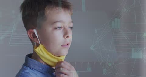 Boy Smiling While Removing Face Mask with Digital Connections Overlay