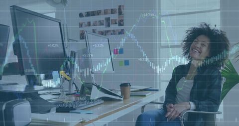 businesswoman analyzing financial charts in office setting - Download Free Stock Images Pikwizard.com