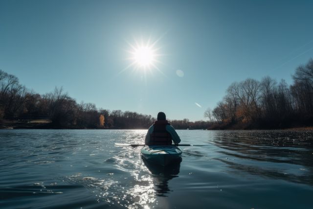 Kayaking on Peaceful Lake under Bright Sun - Download Free Stock Images Pikwizard.com