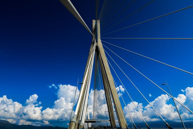 Modern Suspension Bridge with Blue Sky and Clouds - Download Free Stock Images Pikwizard.com