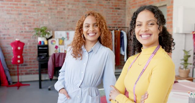 Two Female Fashion Designers Smiling in Studio - Download Free Stock Images Pikwizard.com