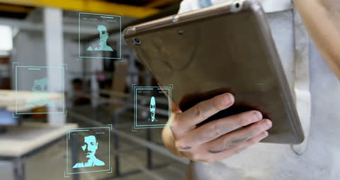 Digital Faces Displayed with Facial Recognition on Tablet