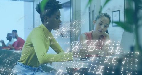 Teamwork in Modern Workspace with Binary Code Overlay