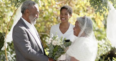 Joyful Senior Couple Weds in Sunny Garden Ceremony