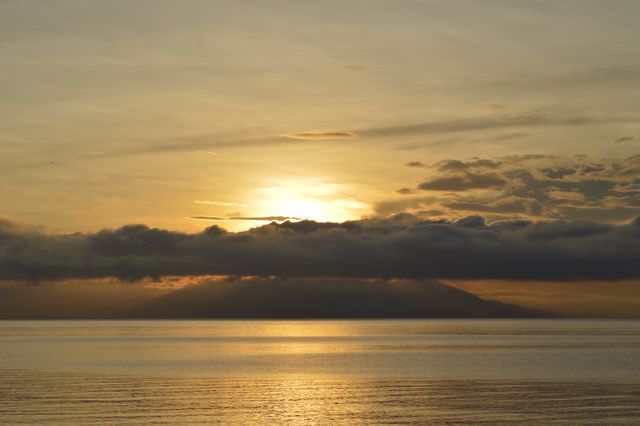 Clouds Above Calm Sea during Sunset - Download Free Stock Photos Pikwizard.com
