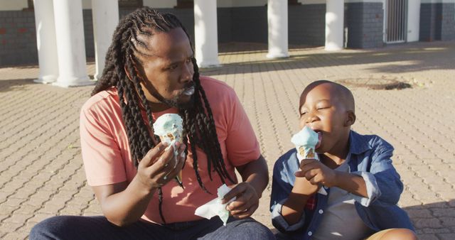 Father and Son Enjoying Ice Cream Outdoors - Download Free Stock Images Pikwizard.com