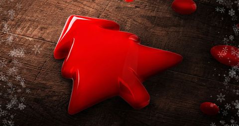 Red gelatin christmas tree on rustic wooden surface