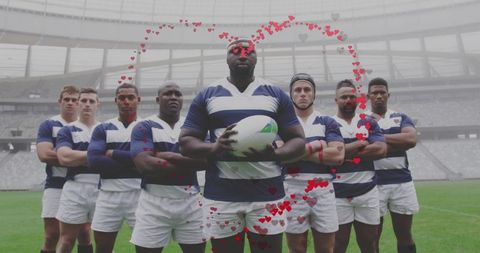 Rugby team standing united with captain holding ball and heart overlay