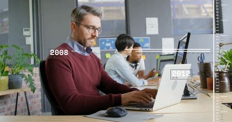 Modern office with technology and diverse team handling financial data