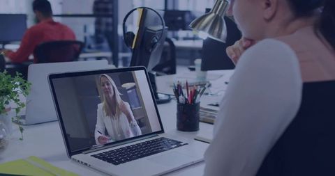 Professional's Video Call in Modern Open Office