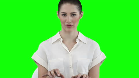 Woman Using Keyboard Against Green Screen Background