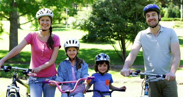 Happy Family Enjoying Outdoor Cycling in Park - Download Free Stock Images Pikwizard.com