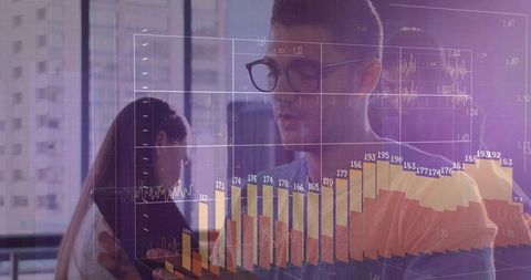 Digital Finance Strategy with Analyst Working on Tablet in Modern Office