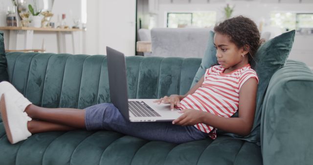 Curious African American Girl Doing Homework on Laptop at Home - Download Free Stock Images Pikwizard.com