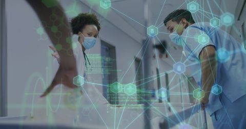 Healthcare Professionals Analyzing Digital Data with Futuristic Display